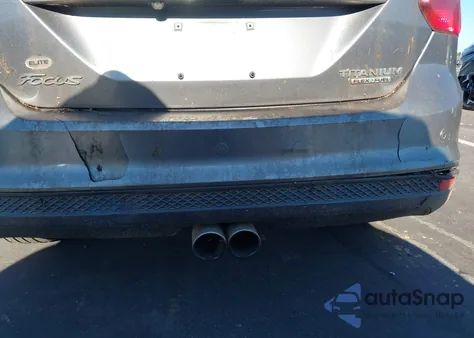 2014 Ford Focus Titanium z USA, uszkodzony, nr VIN 1FADP3N26EL190505